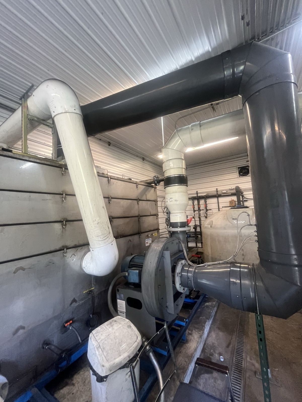 Air-stripper and treatment skid installed at a customer site